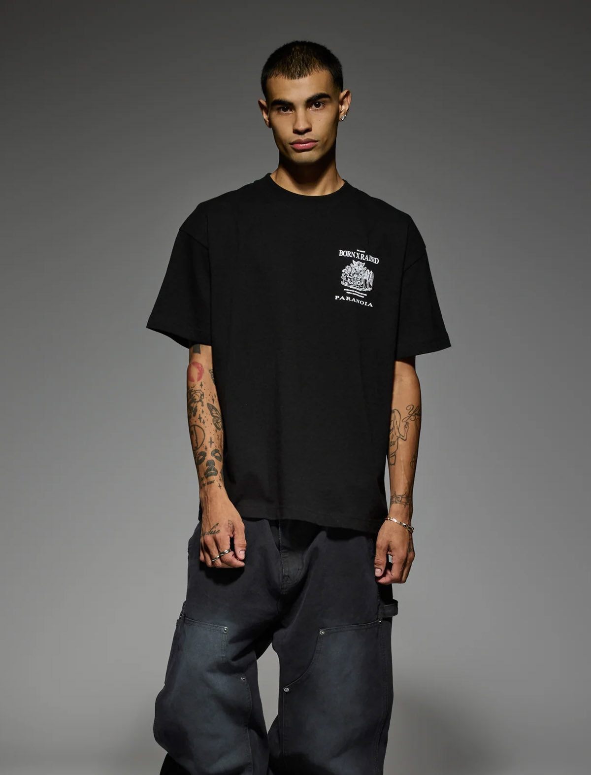 Born X Raised Paranoia Crest T-Shirt in Black – worn, front view