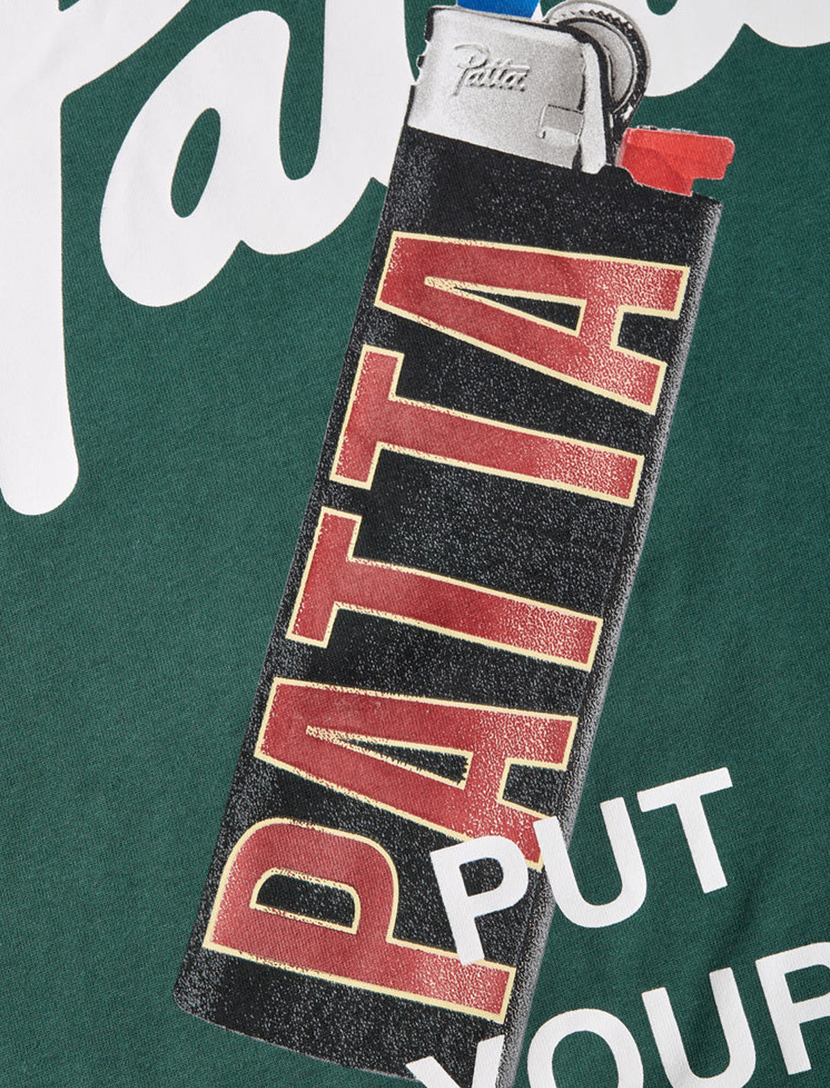Lighter with 'Patta' branding on a green background