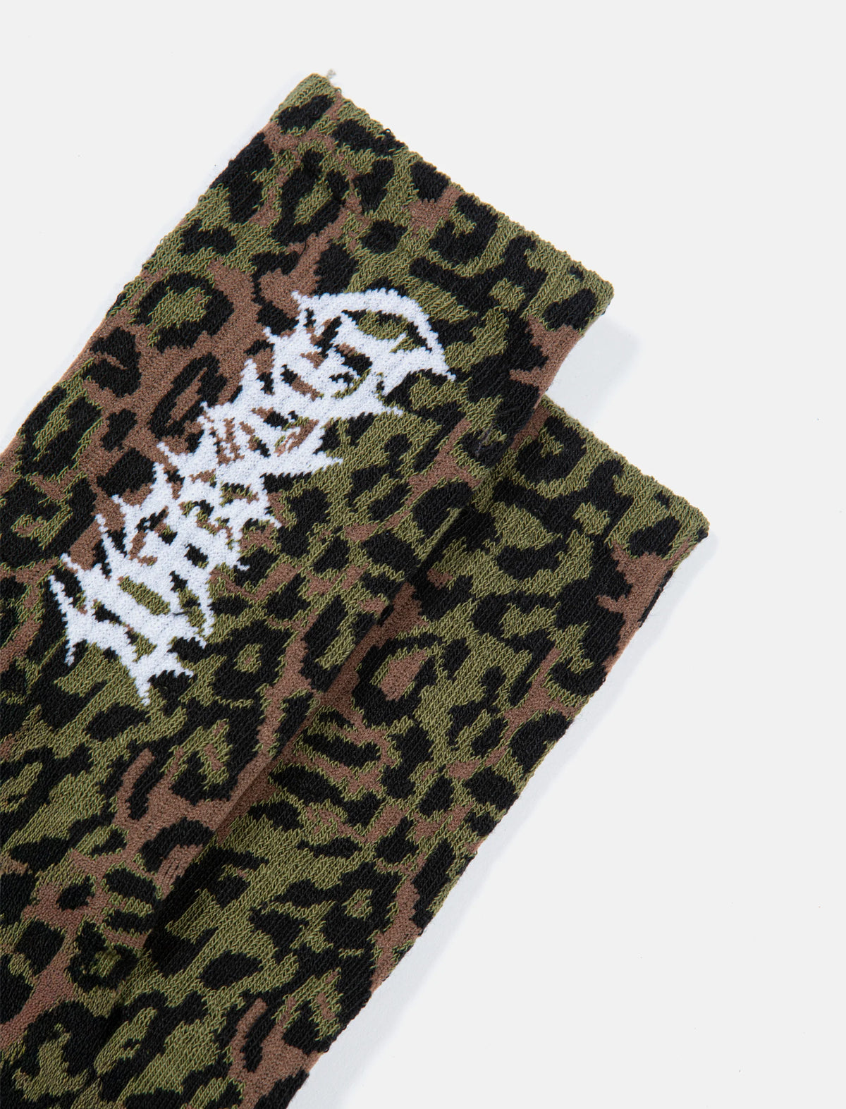 Green leopard print socks with a white logo on a light gray background
