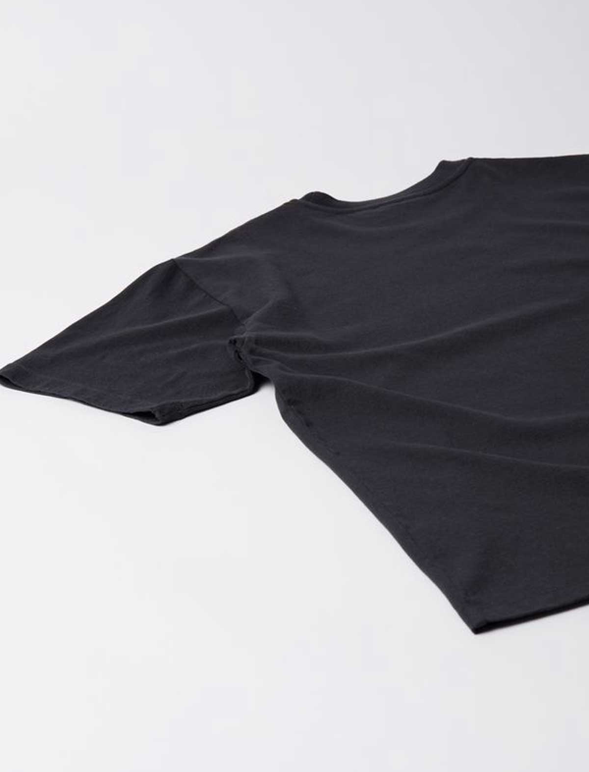 Black t-shirt on a white background