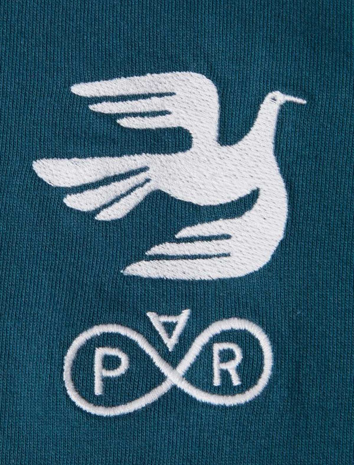 By Parra infinite White dove emblem with 'PARRA' logo on a blue background