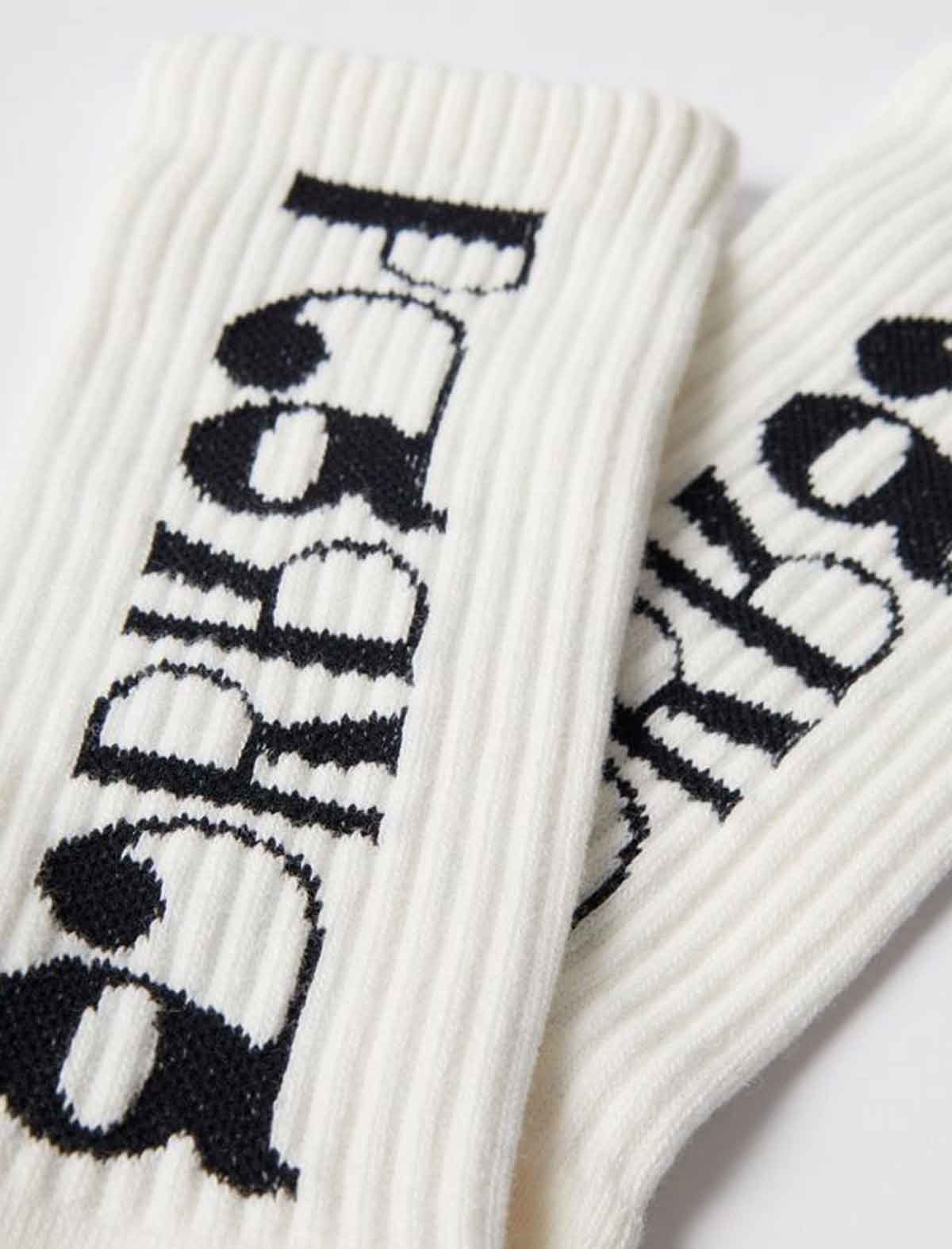By Parra Tokyo Logo White socks with black text on a white background