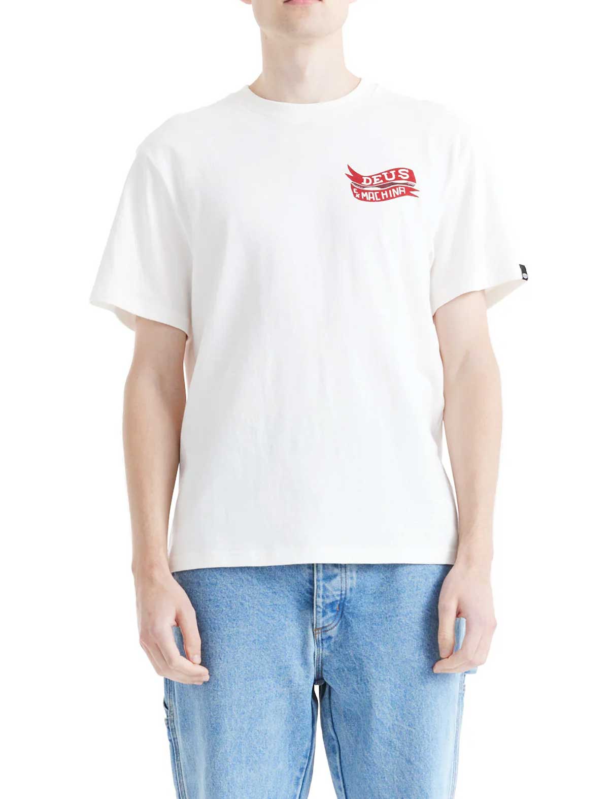 Person wearing a deus ex machina jailer sappy white t-shirt with a red logo and blue jeans on a white background