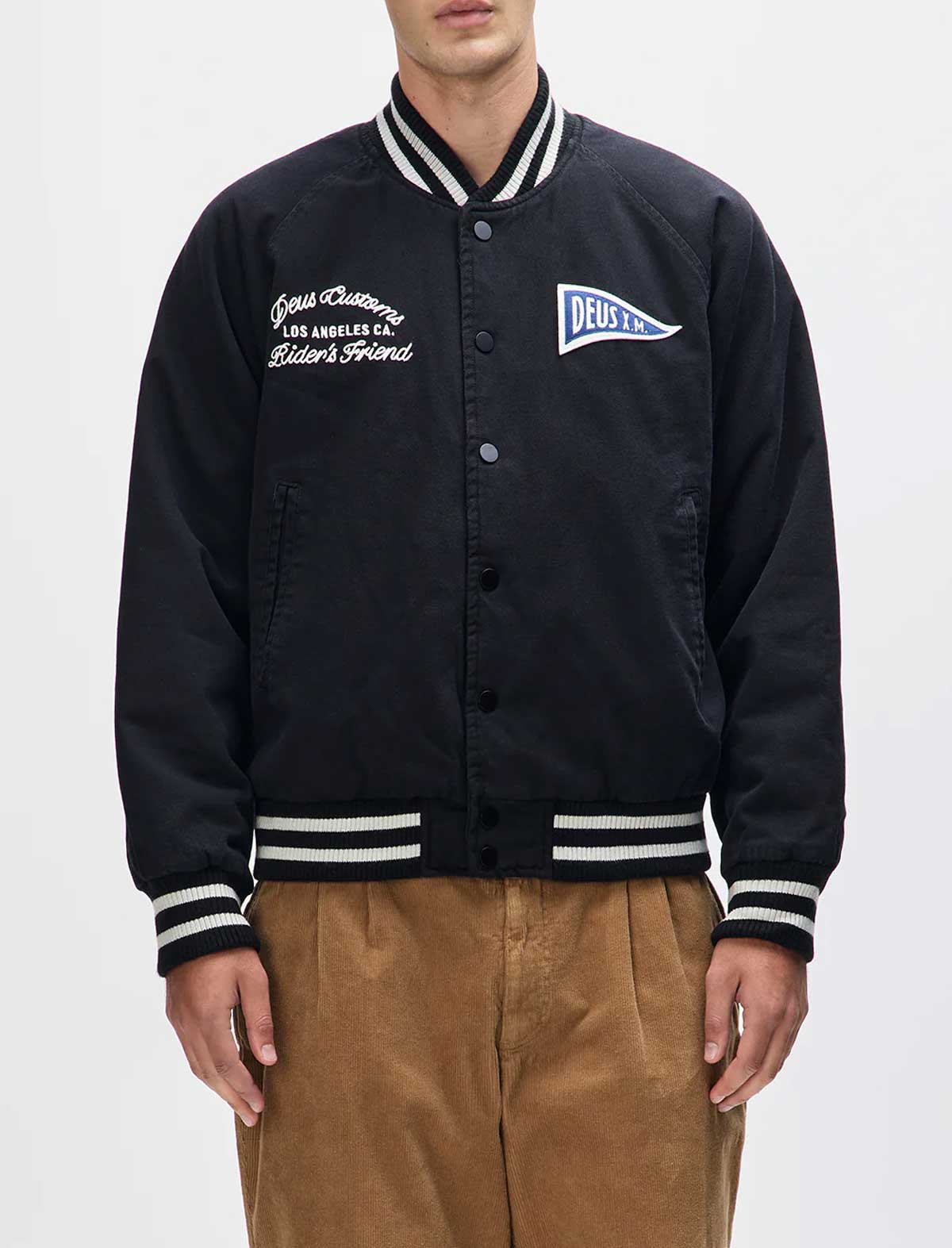 Black varsity jacket with white lettering and logos on a white background