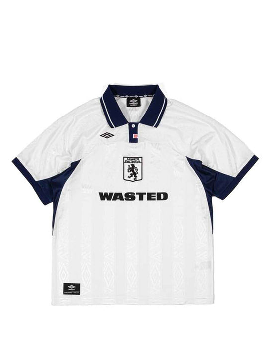 Wasted Paris x Umbro Football White sports jersey with navy accents and 'WASTED' text on a white background