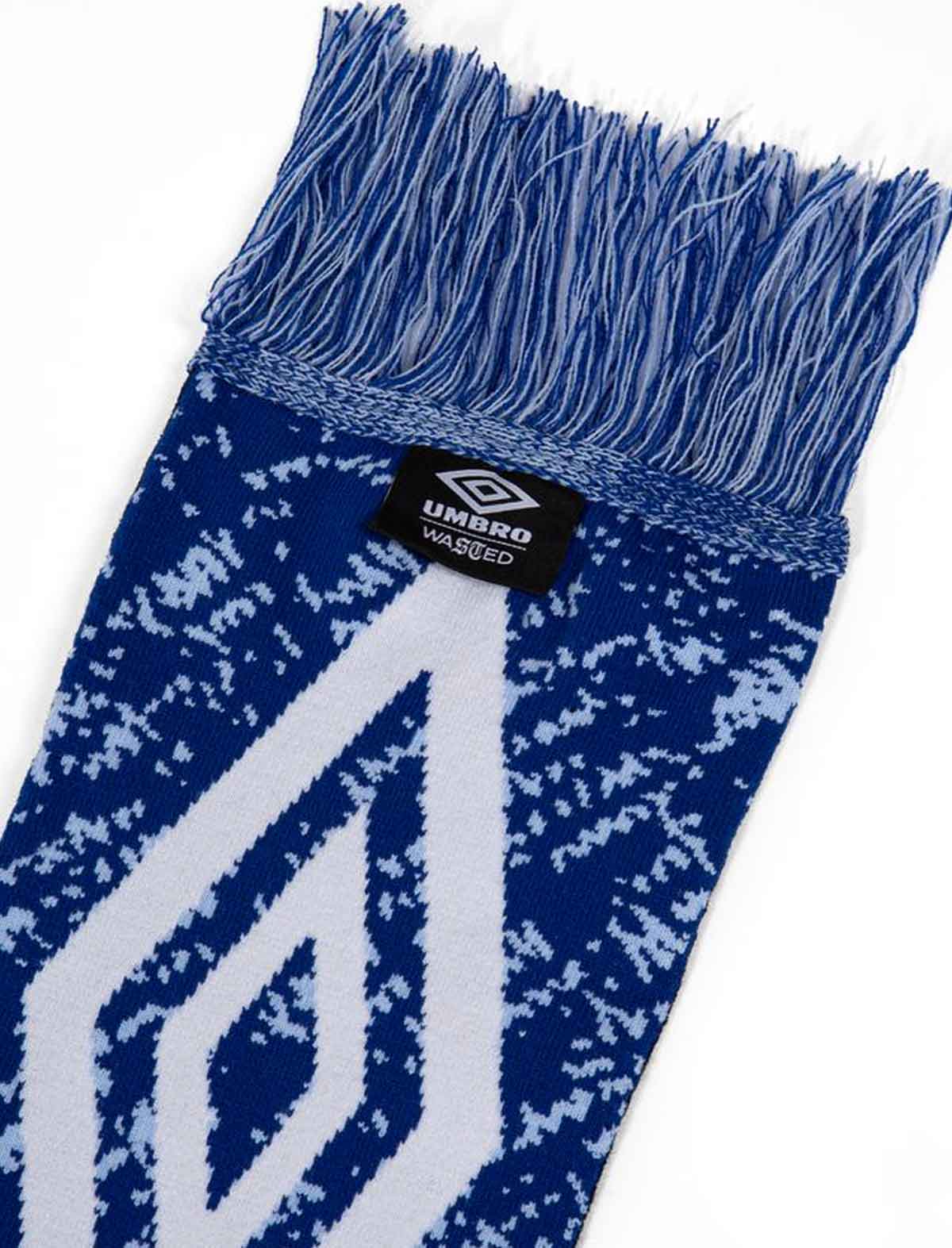 Wasted Paris x Umbro Trompe L'Oel Blue and white patterned scarf with Umbro logo on a white background