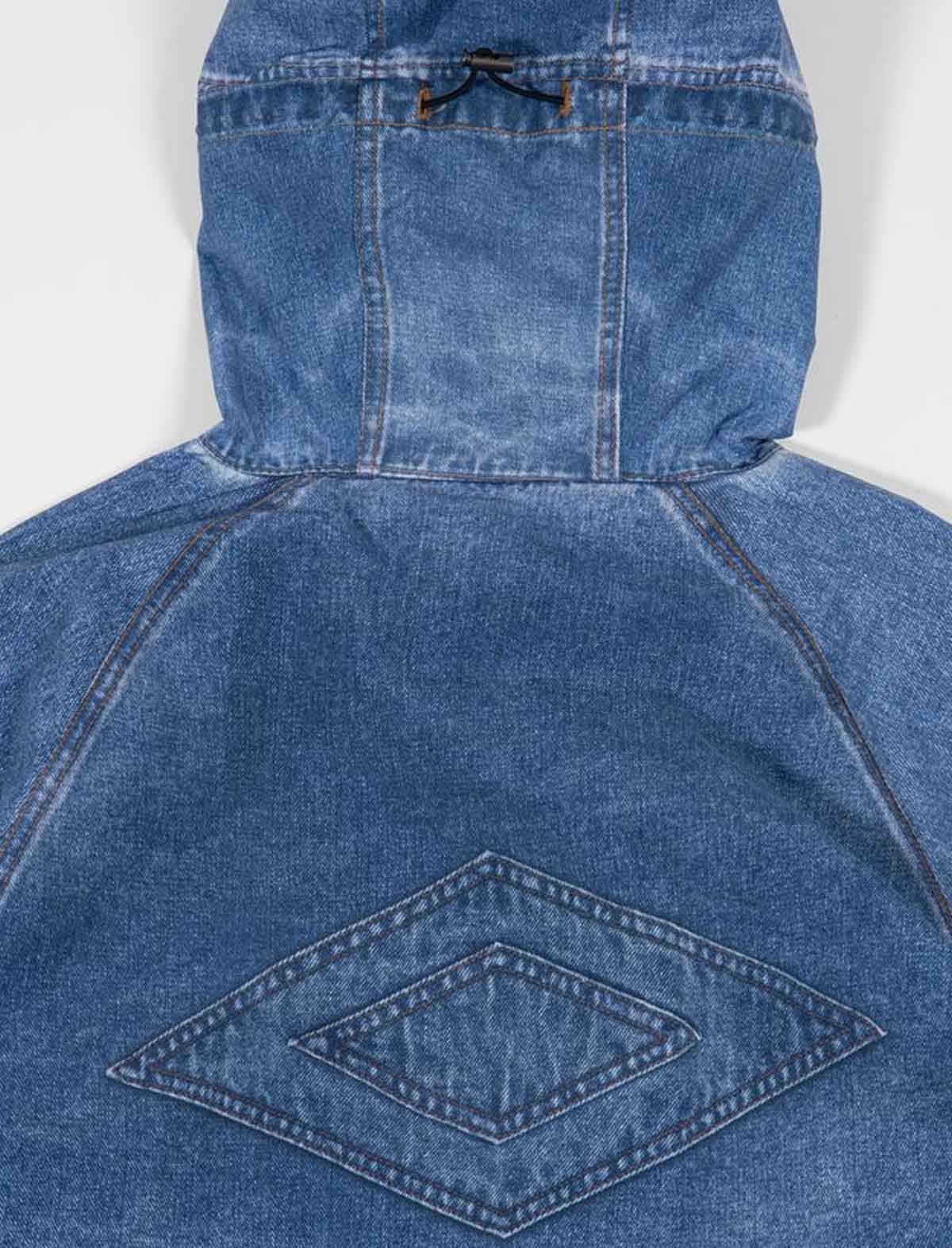 Wasted Paris x Umbro Trompe L'Oel Windbreaker Blue denim hooded jacket with a diamond pattern on a white background