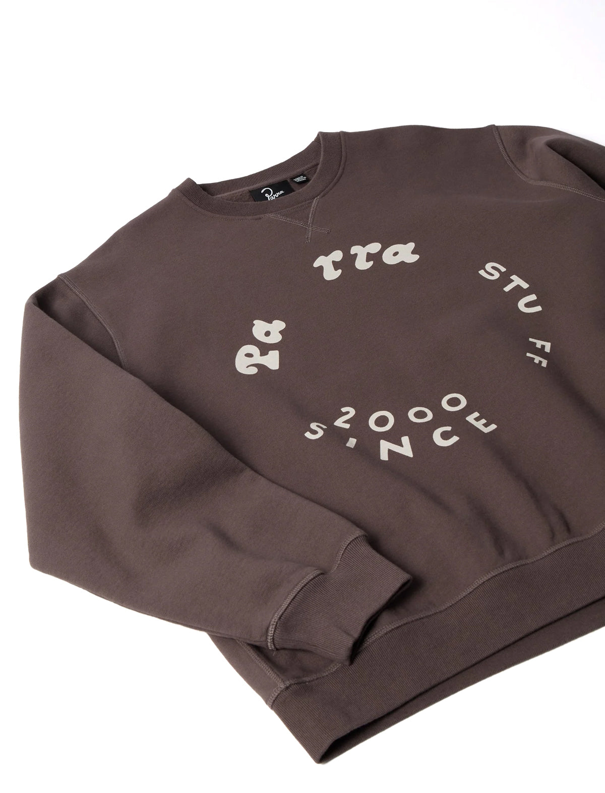 By Parra Brown sweater on a white background