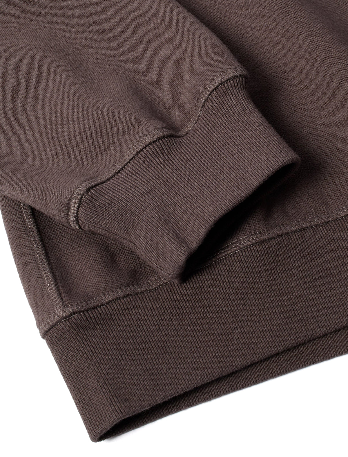 Close-up of a brown sweatshirt on a white background