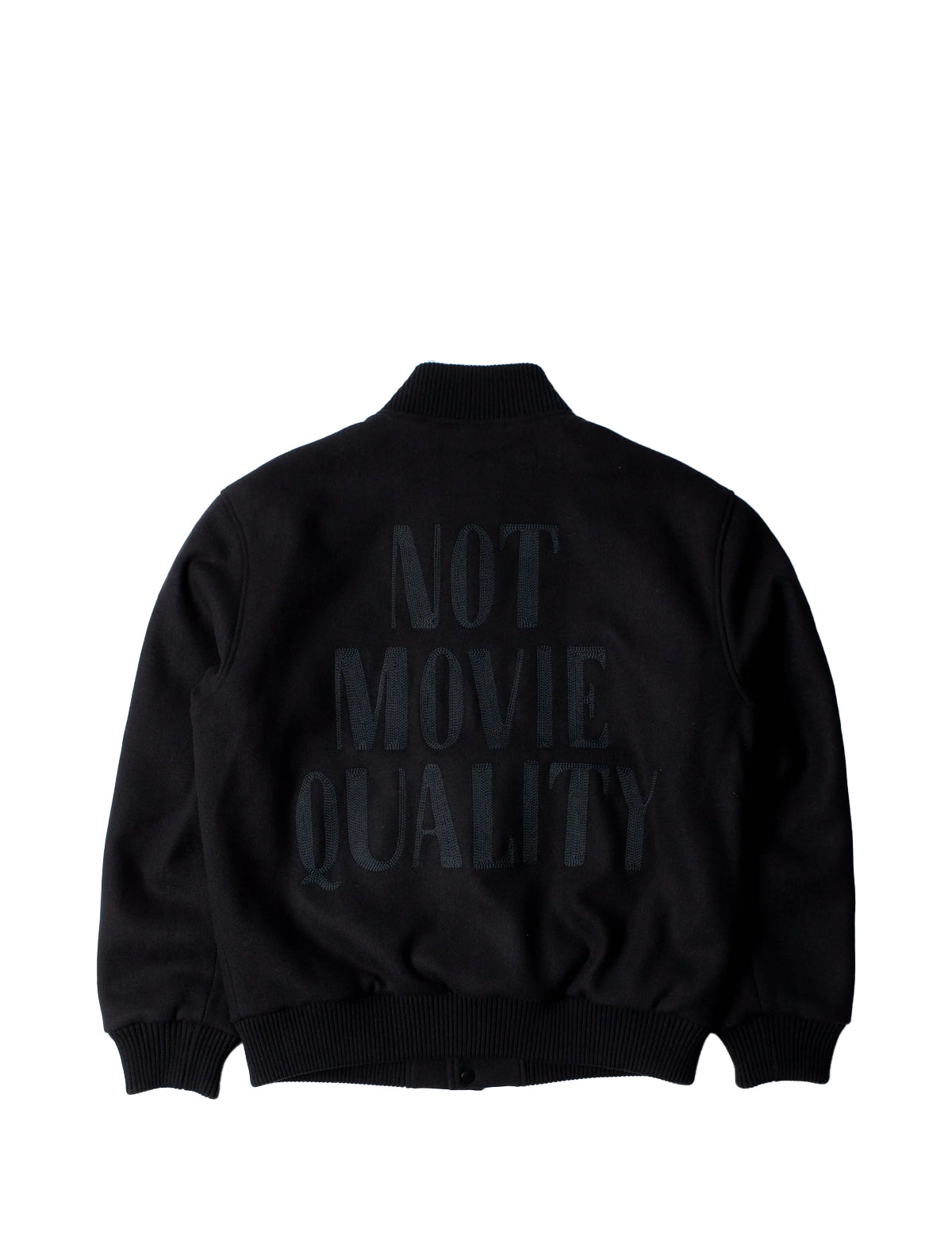 Black jacket with 'Not Movie Quality' text on a white background