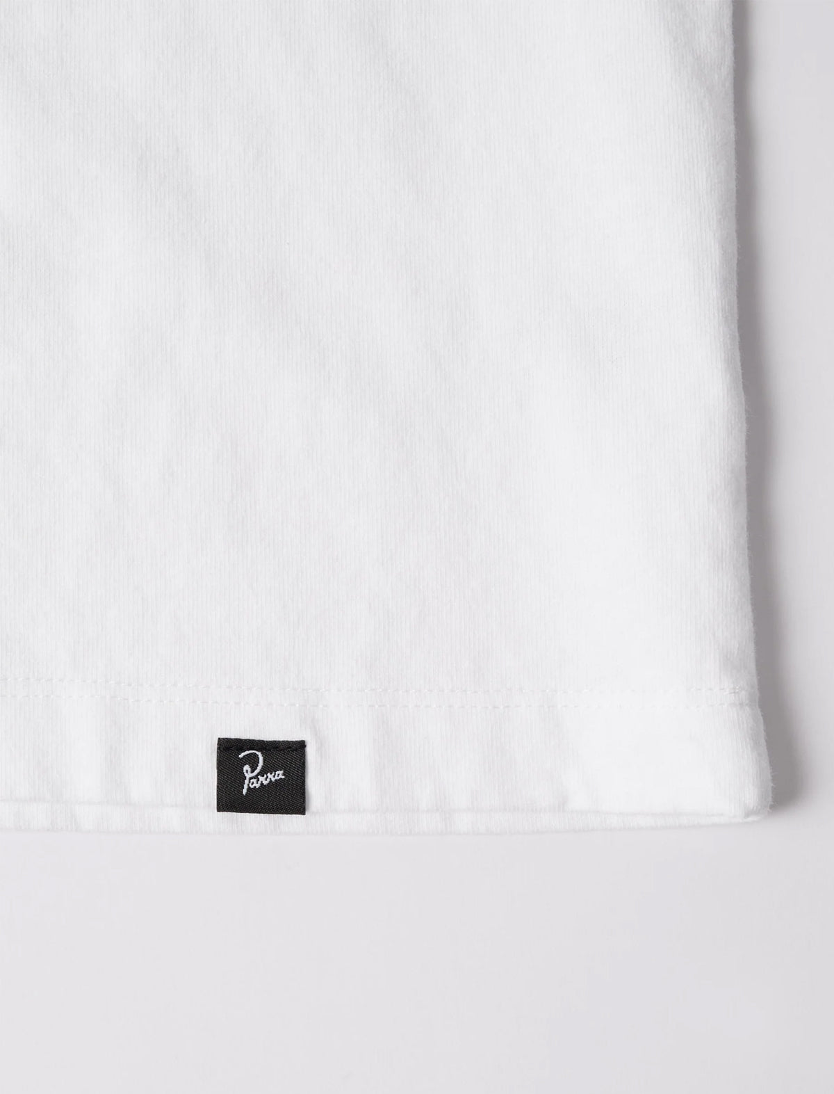 By Parra label on white t-shirt