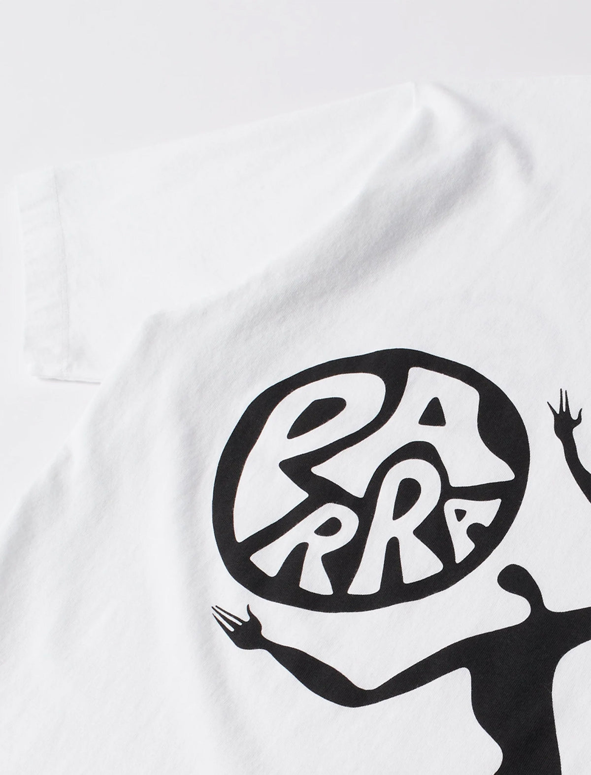 White t-shirt with black graphic design featuring the word 'PARRA'.
