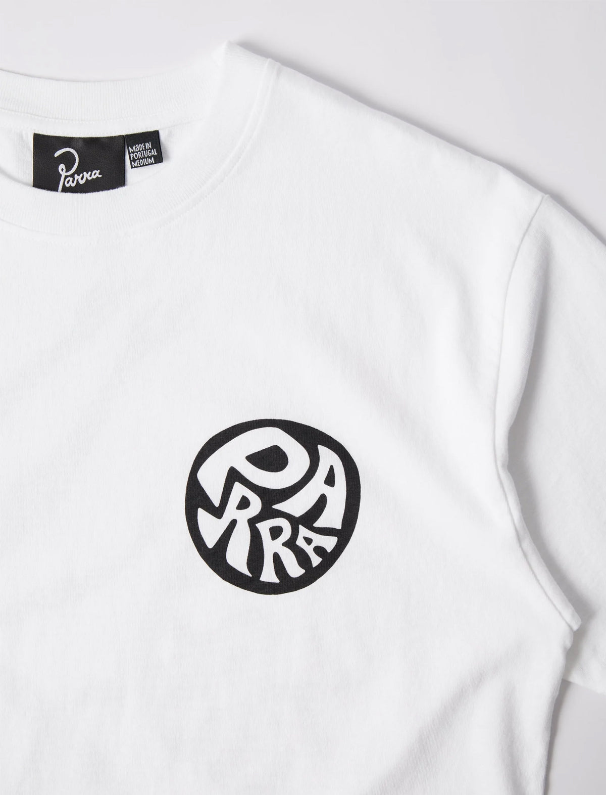 By Parra Logo on a white t-shirt