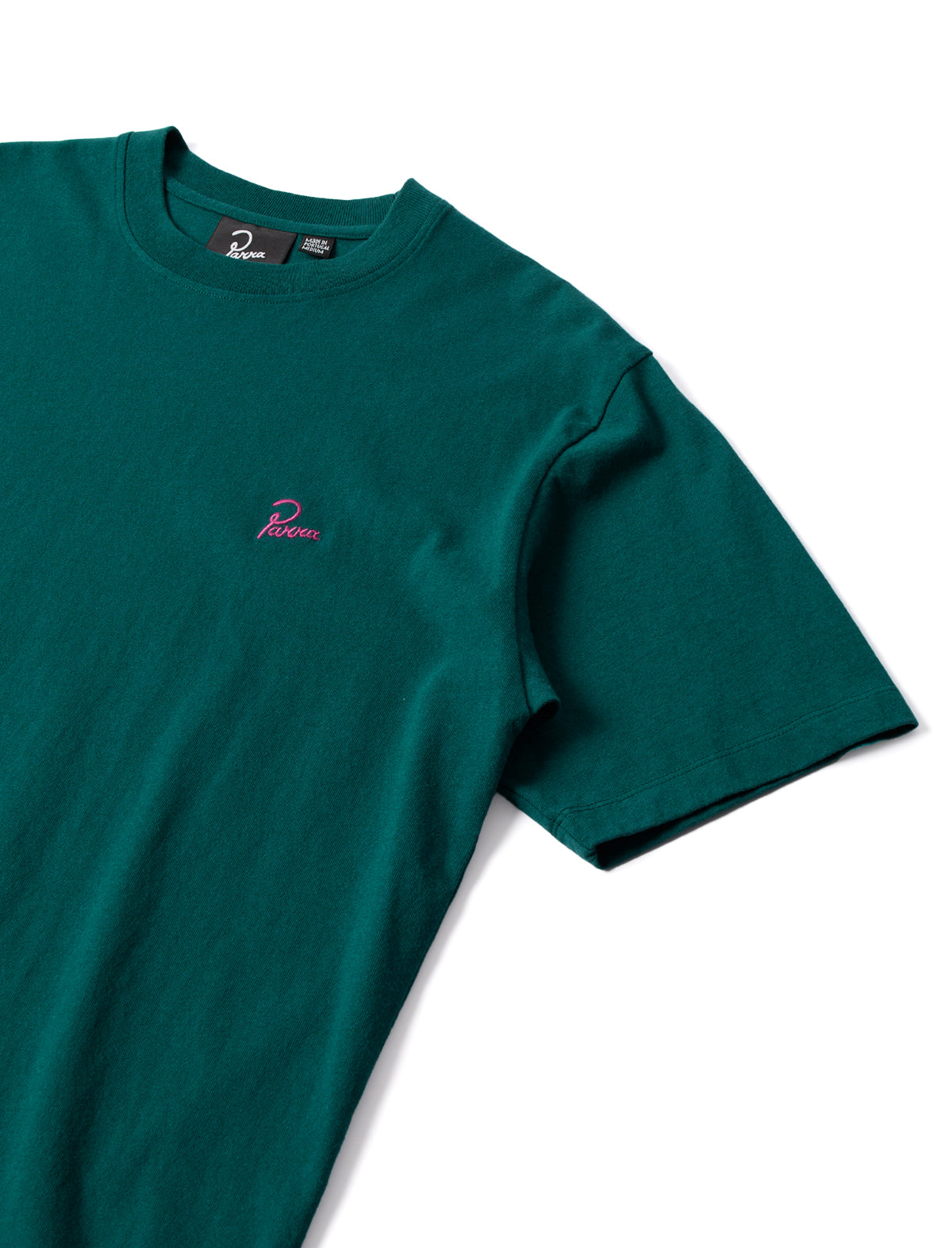 by parra Green t-shirt with a small logo on a white background