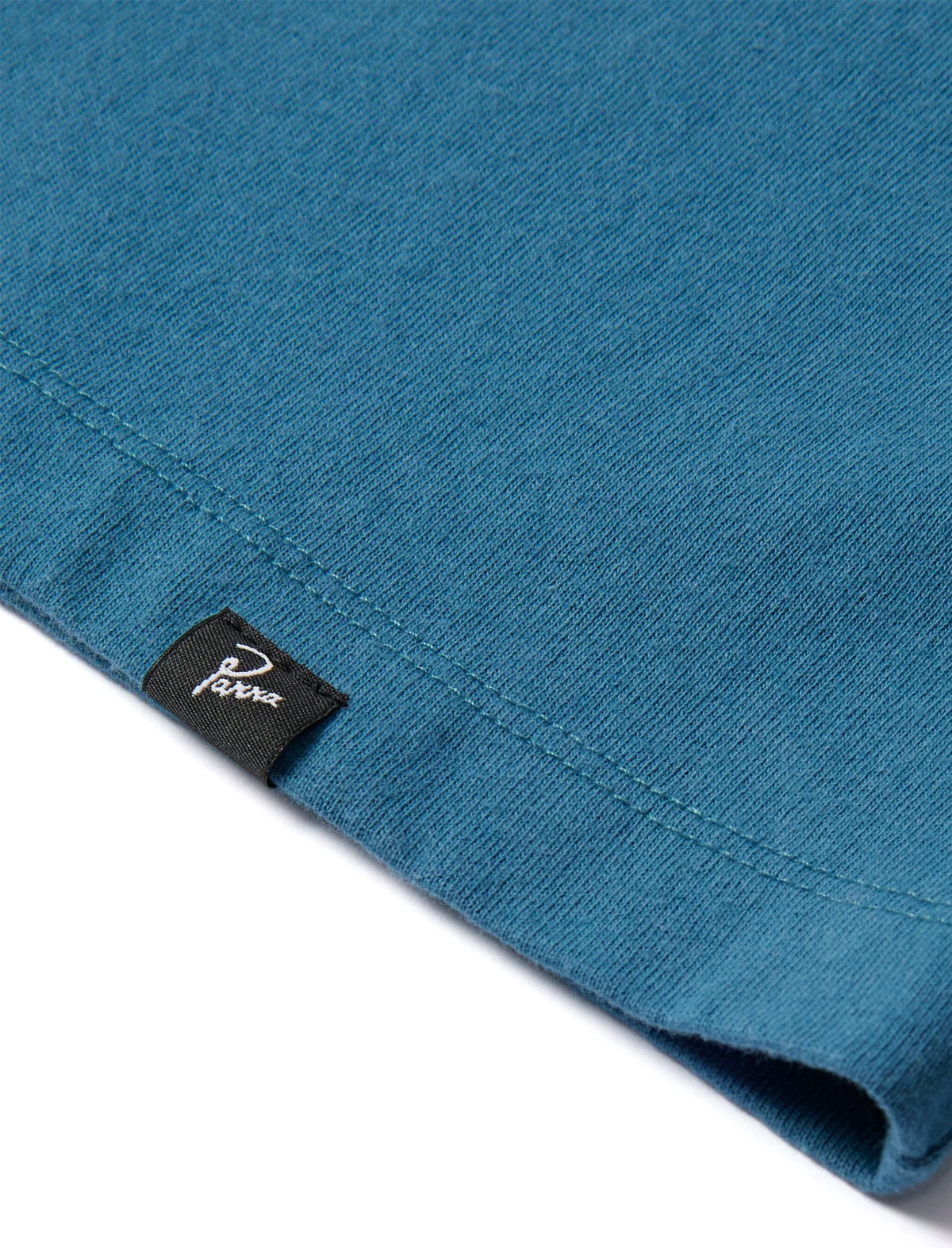 By Parra label on a Blue Shirt