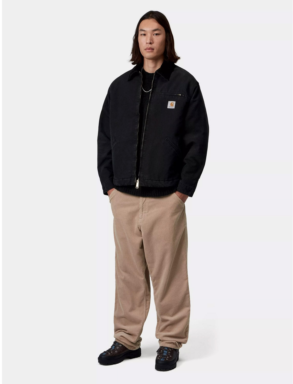 Carhartt WIP OG Detroit Jacket in Black Stone Washed, full-length view on model