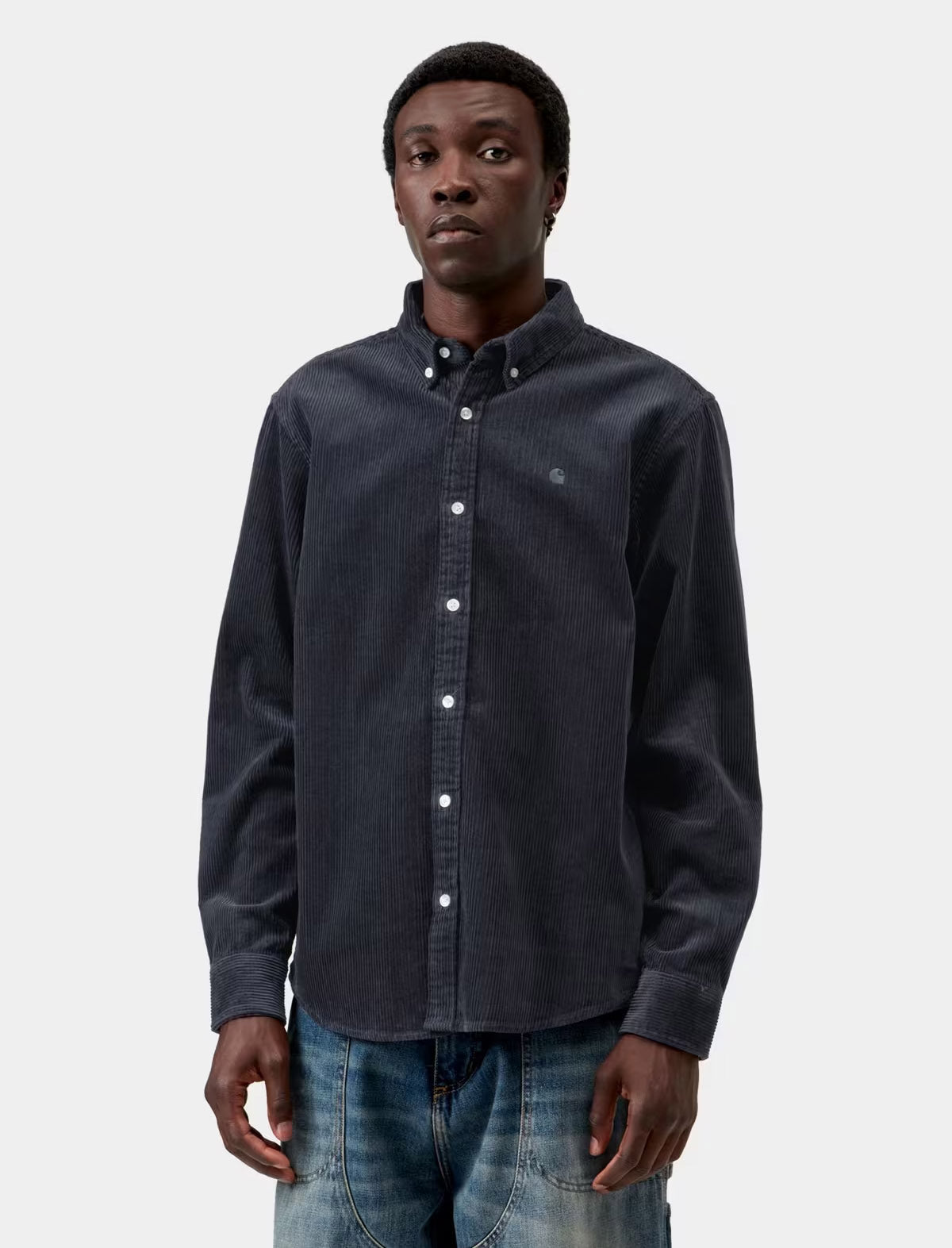Carhartt WIP L/S Madison Cord Shirt in Dark Navy, worn on model, front