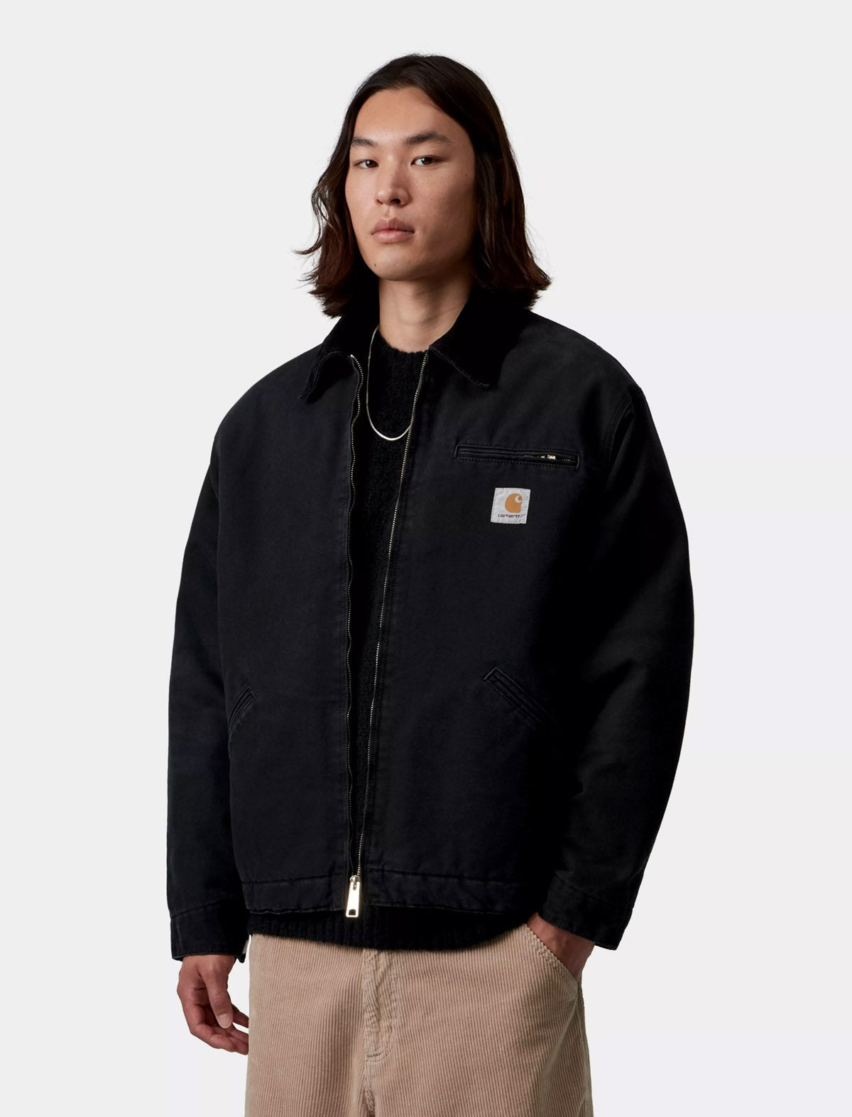 Carhartt WIP OG Detroit Jacket in Black Stone Washed, worn on model, front