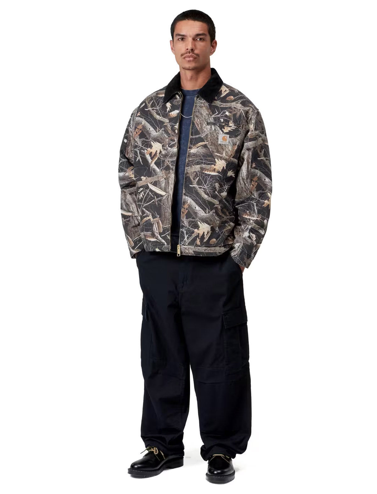 Full-length view of the Carhartt WIP OG Detroit Jacket in Camo Feather Tree