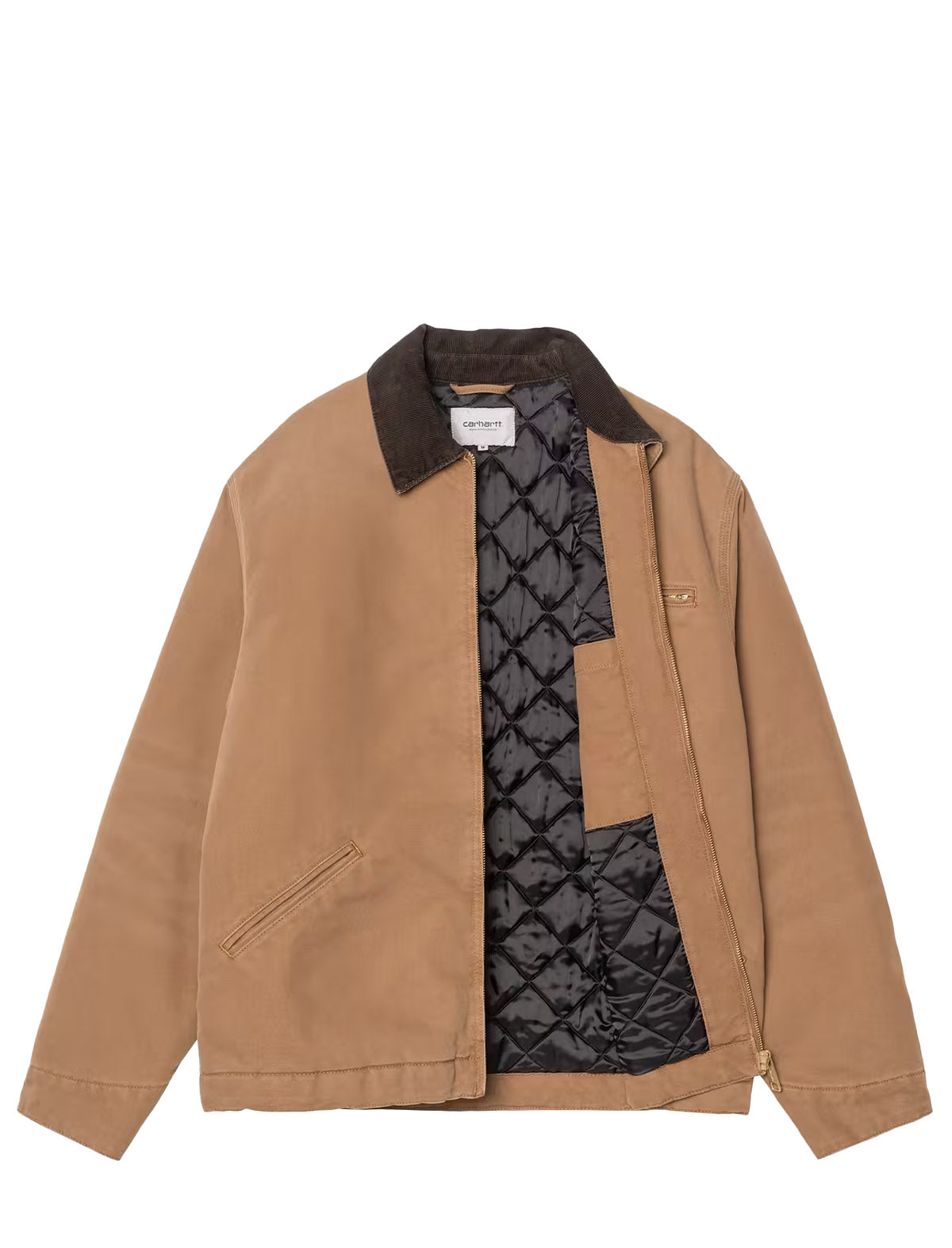 A tan canvas utility jacket with a dark brown corduroy collar, featuring a black quilted lining visible along the open front and pocket.