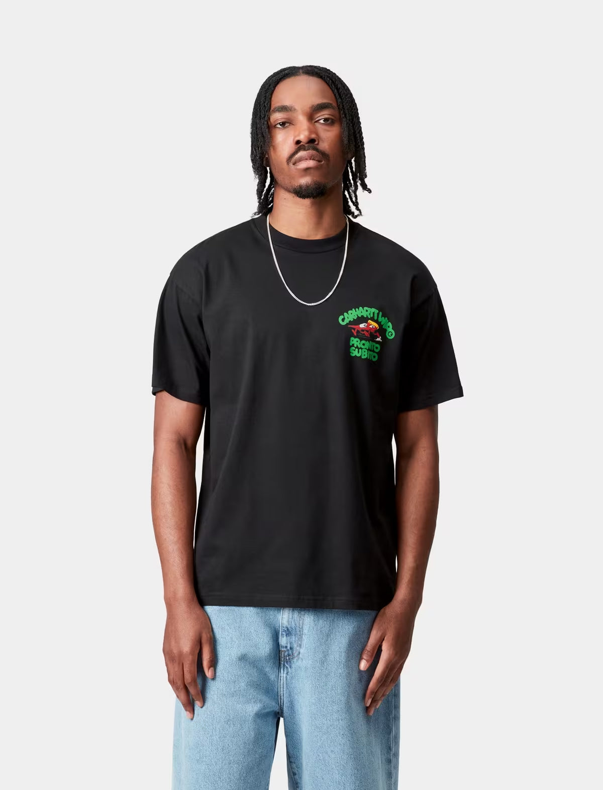 Person wearing a carhartt pronto black t-shirt with a logo on a white background