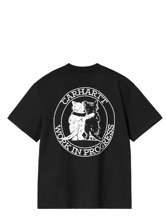 A black short-sleeve t-shirt with a large white circular graphic on the back featuring a cat and dog hugging, with the text 'CARHARTT WORK IN PROGRESS'.