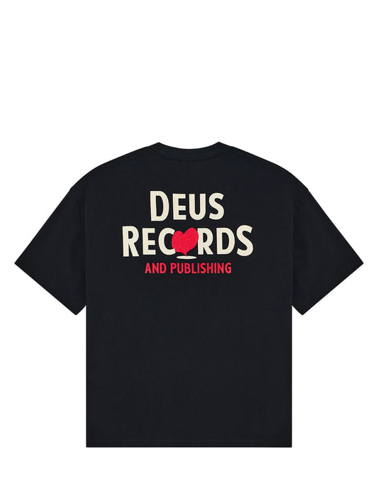A black short-sleeve t-shirt shown from the back, featuring a graphic print that reads 'DEUS RECORDS' in cream with a red heart logo, and 'AND PUBLISHING' in red below.