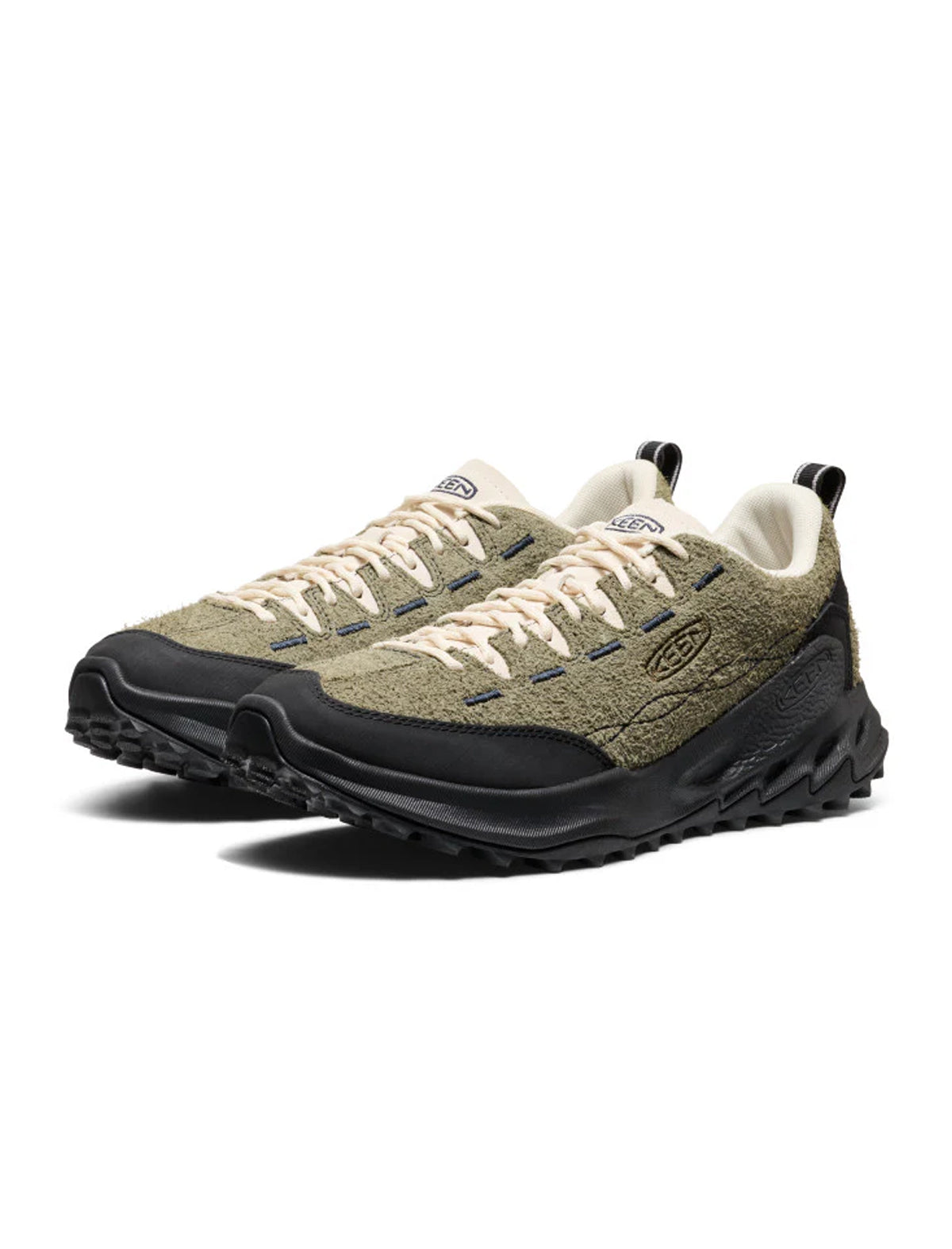 Pair of keen jasper zionic hiking shoes with green suede upper and black sole on a white background
