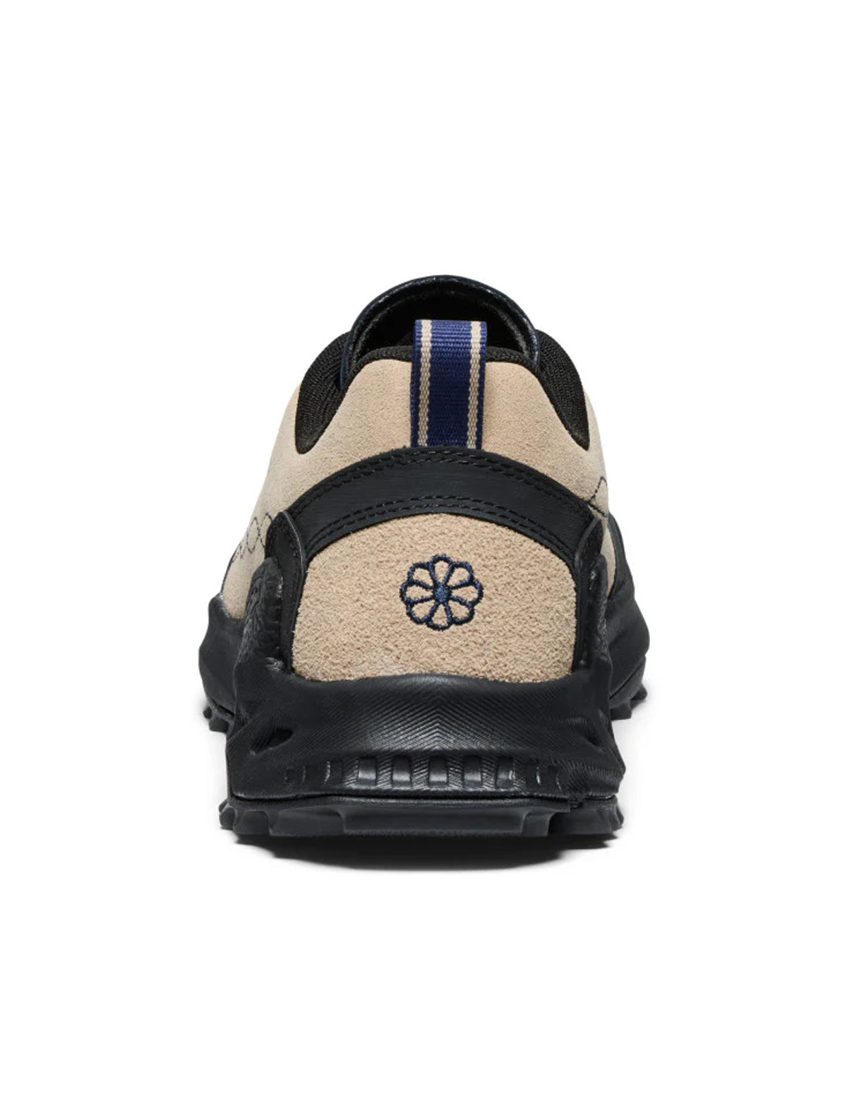Back view of a black and beige sneaker with a brand logo on a white background