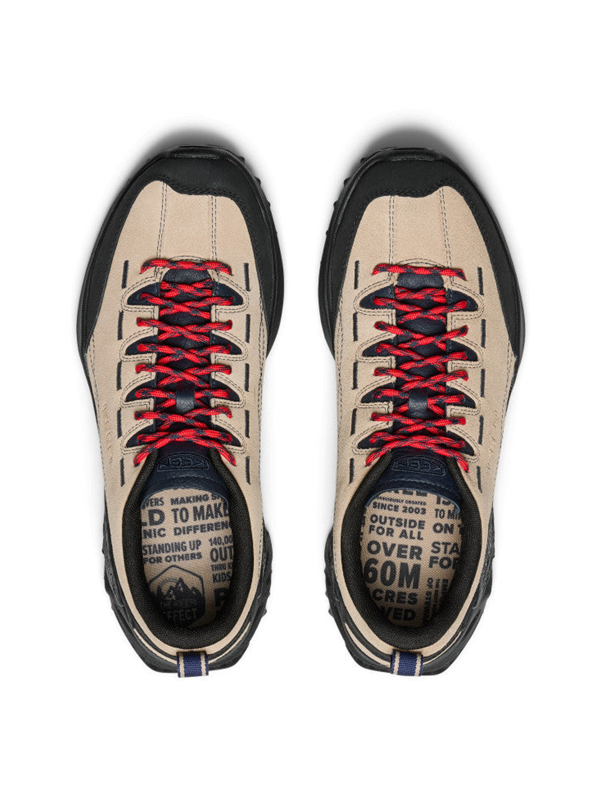 Pair of keen jasper zionic beige sneakers with red and black laces on a white background