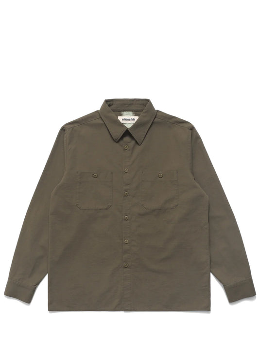 Green Metalwood shirt with button details on a white background