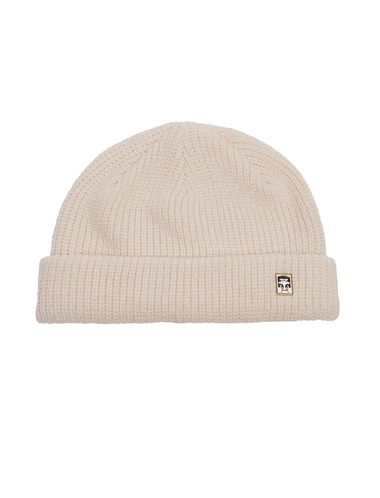 Obey Micro Beige knit beanie with a small logo on a white background