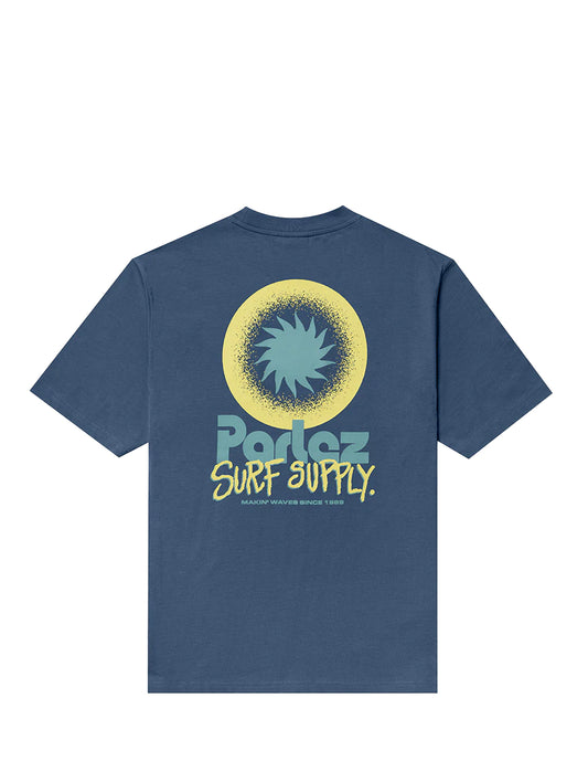 Blue t-shirt with a 'Parlez Surf Supply' logo on the back against a white background