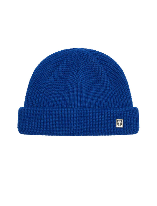Obey Micro Beanie in Surf Blue, a shallow waffle knit fisherman beanie with an Obey logo pin on the cuff
