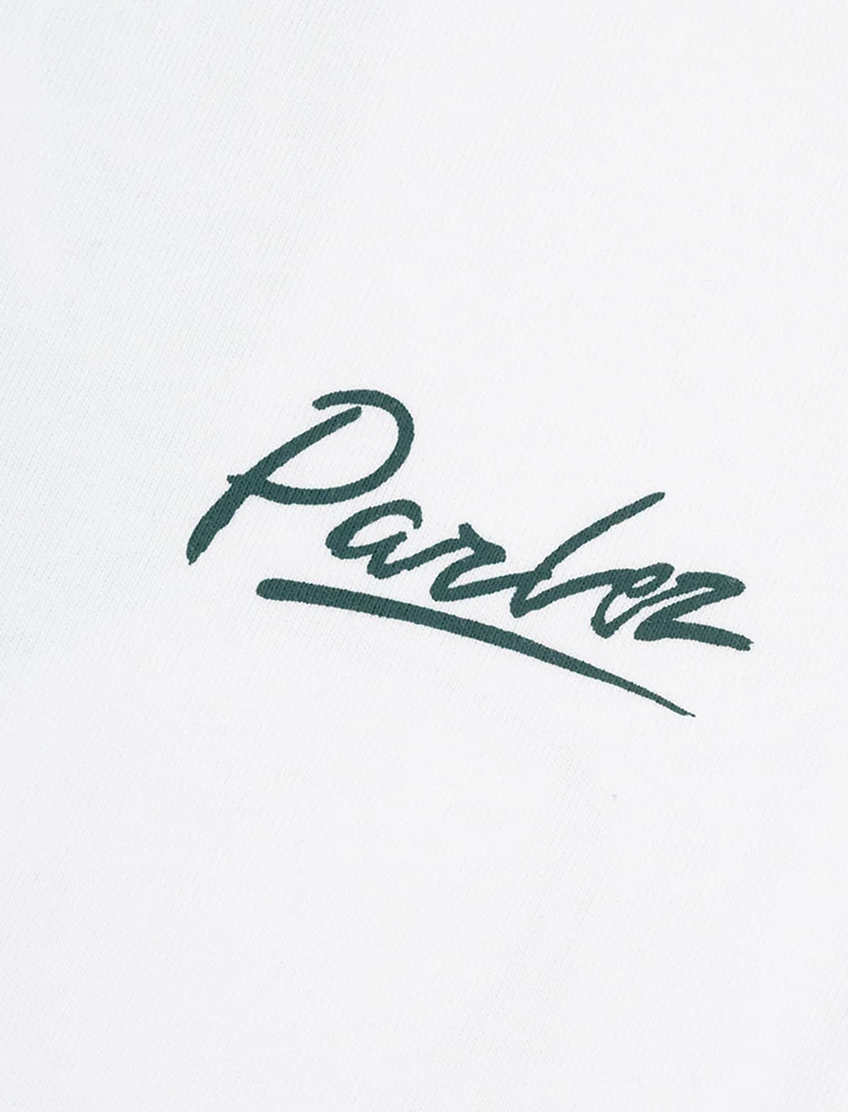 A close-up of a white fabric surface featuring a dark green cursive script logo that reads 'Parlez'.