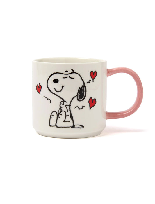 A white ceramic mug with a black handle featuring the Peanuts I Love You Snoopy design, set against a plain white background.