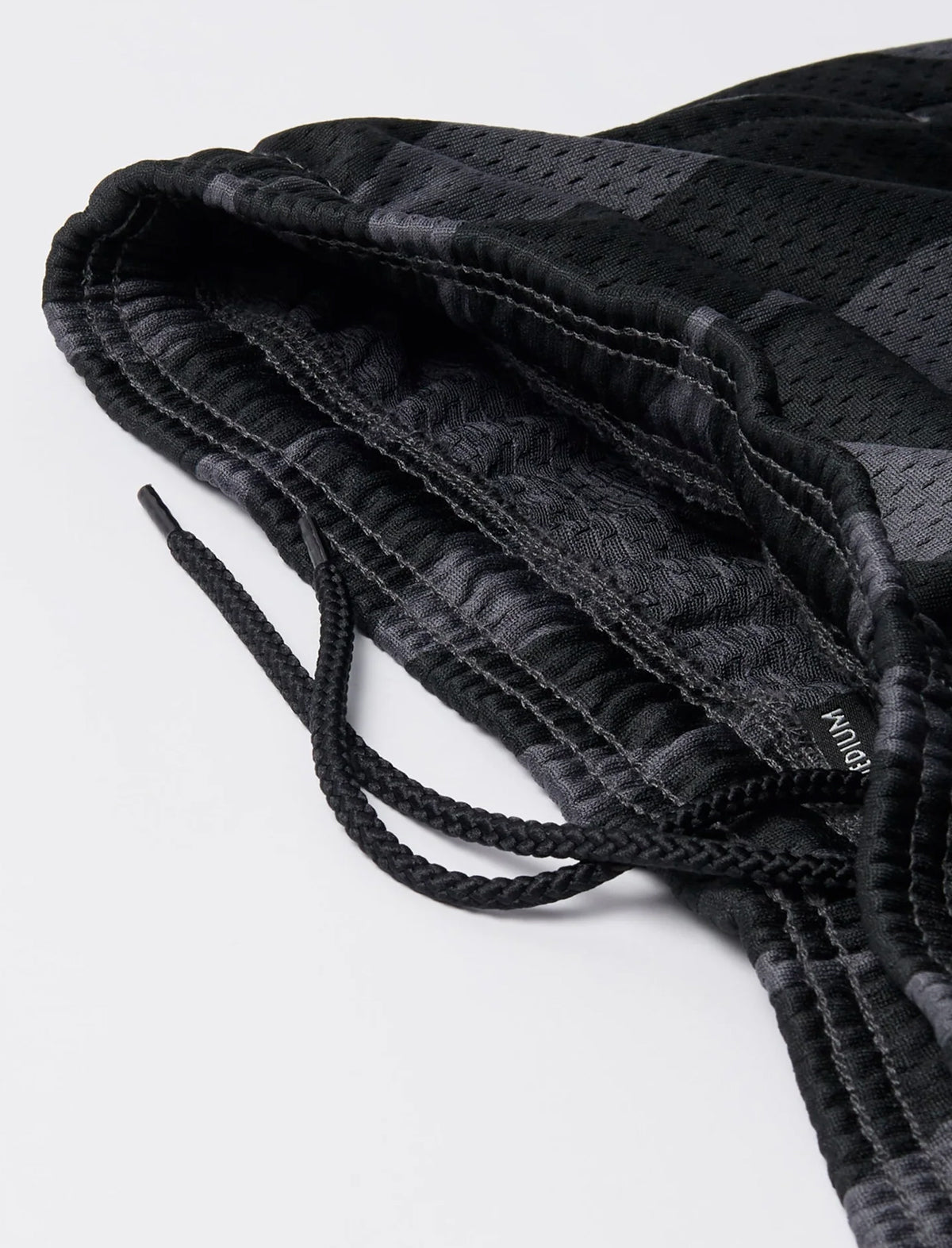 By Parra Waved Mesh Shorts