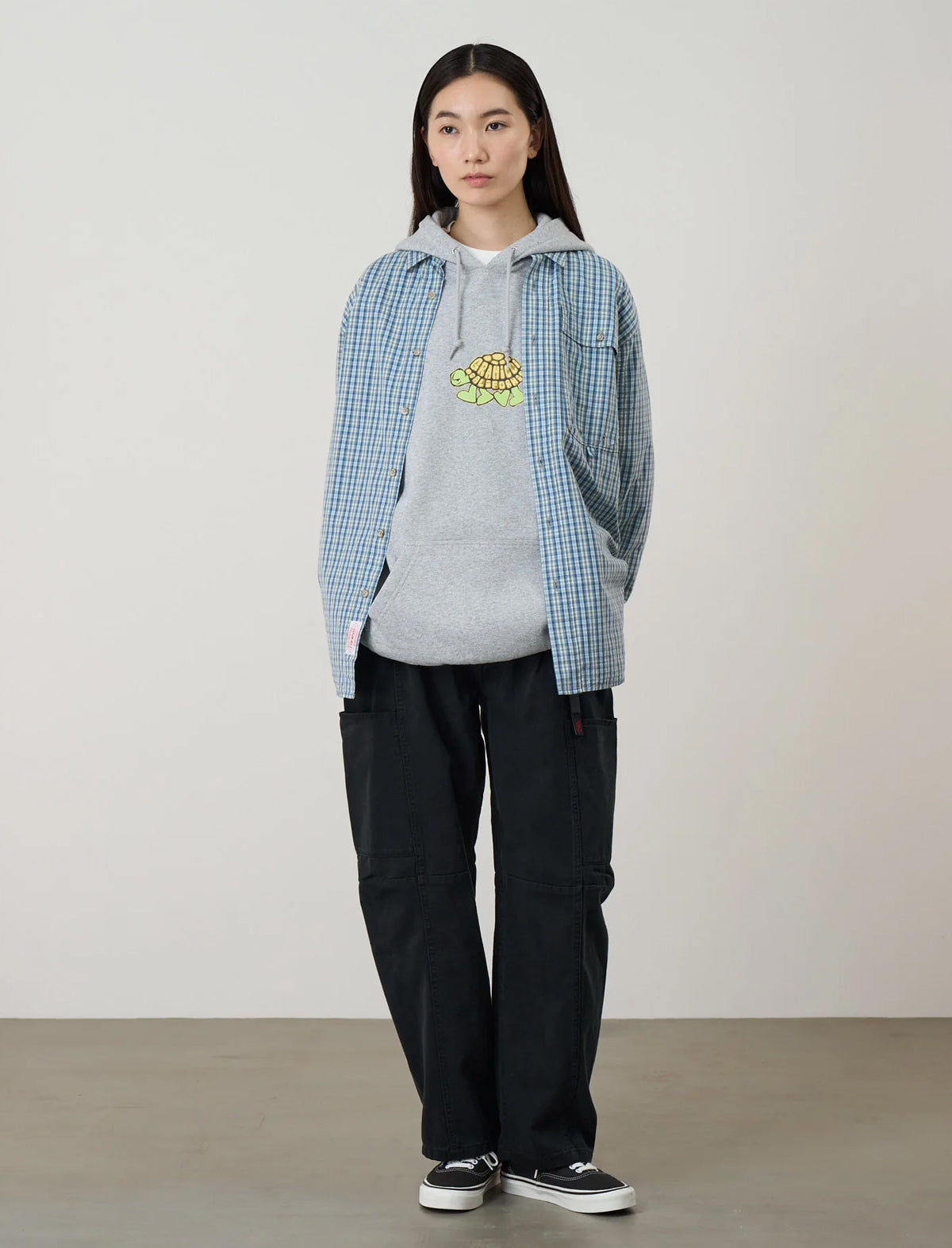 Model wearing the Gramicci Women's Voyager Pants in Black, front view