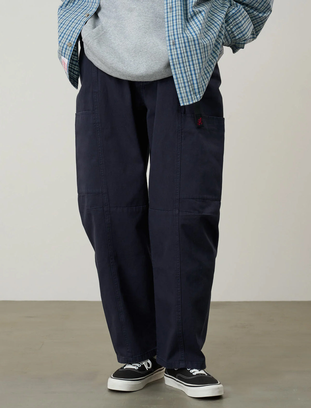 Model wearing the Gramicci Women's Voyager Pants in Double Navy, close-up detail