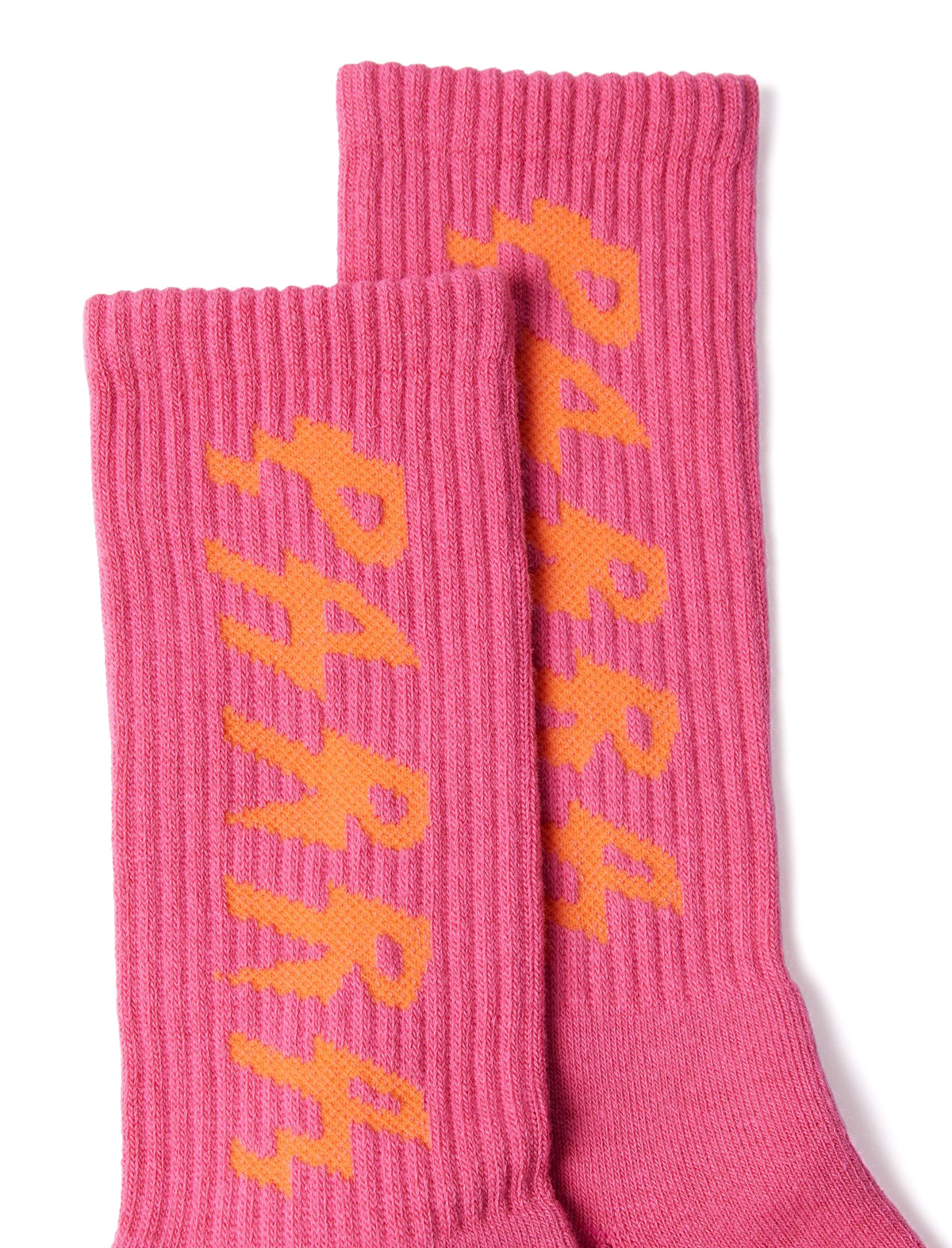 Pink socks with orange 'PARRA' branding on a white background