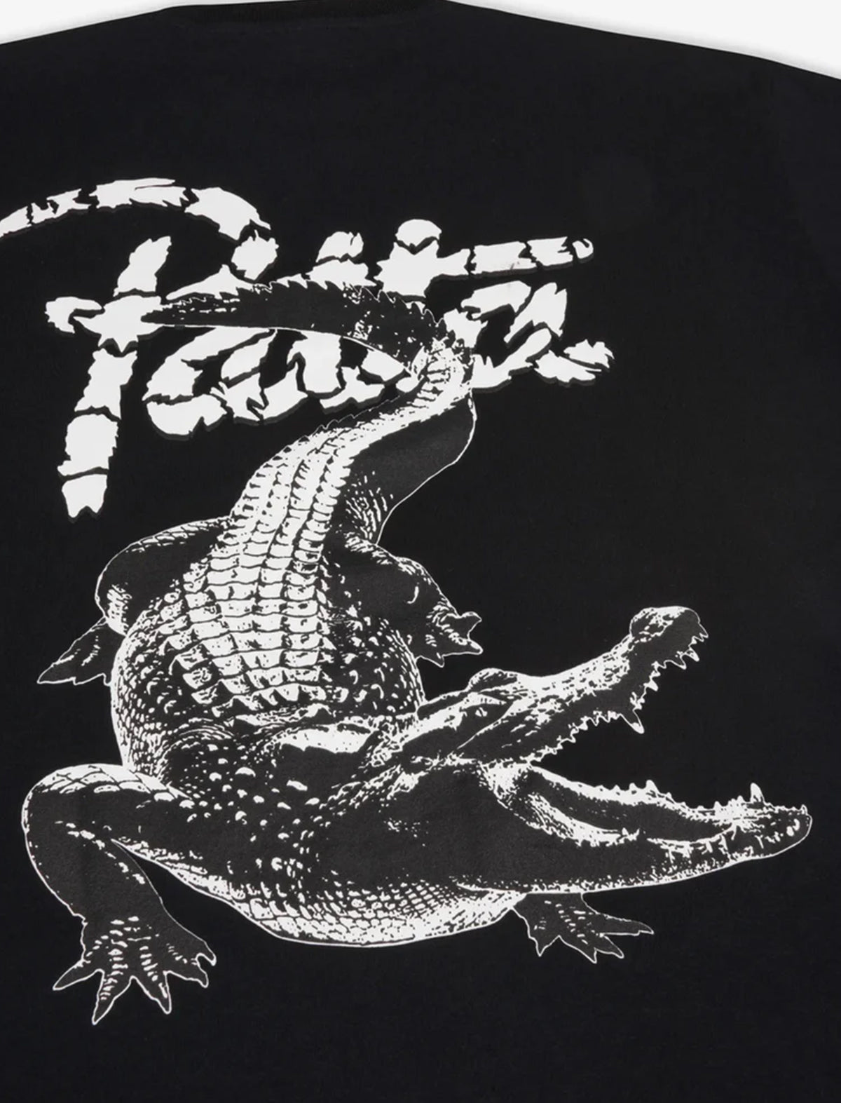 Black t-shirt with white alligator graphic and 'Patta' text on a black background