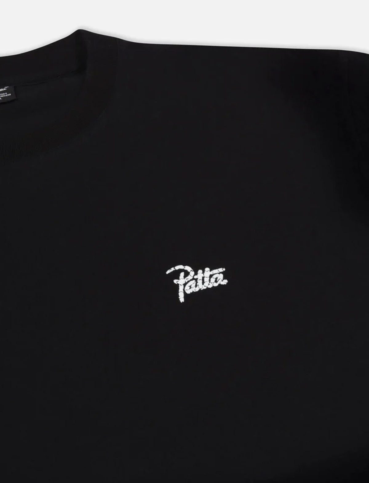 Black t-shirt with white Patta logo on a white background