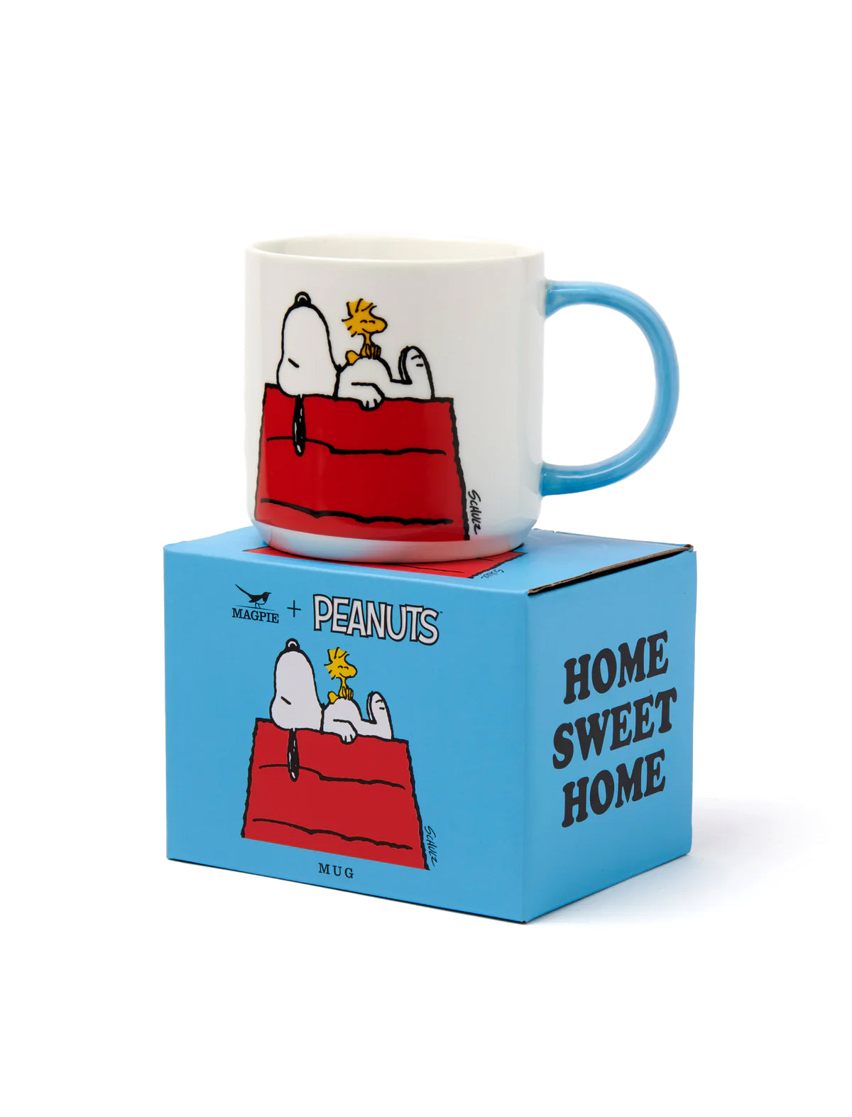 Snoopy-themed mug with a blue handle on a matching box against a white background