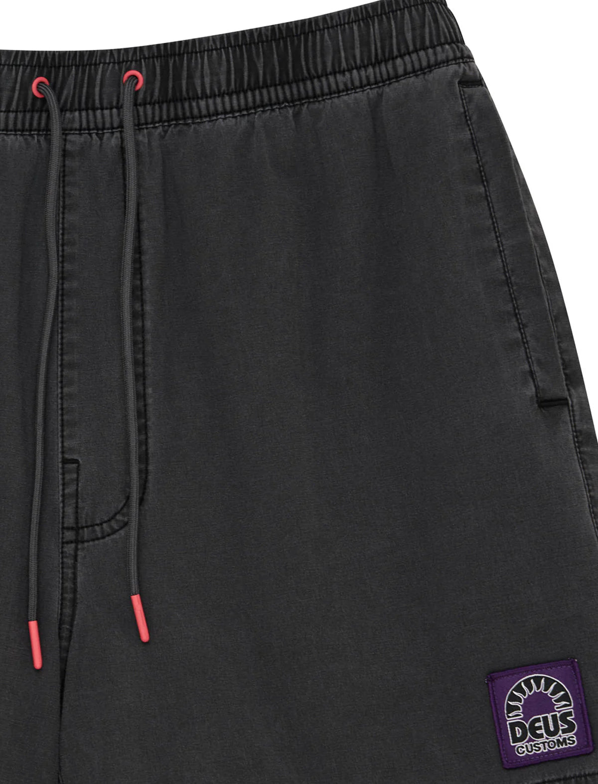 Black shorts with a purple patch on a white background