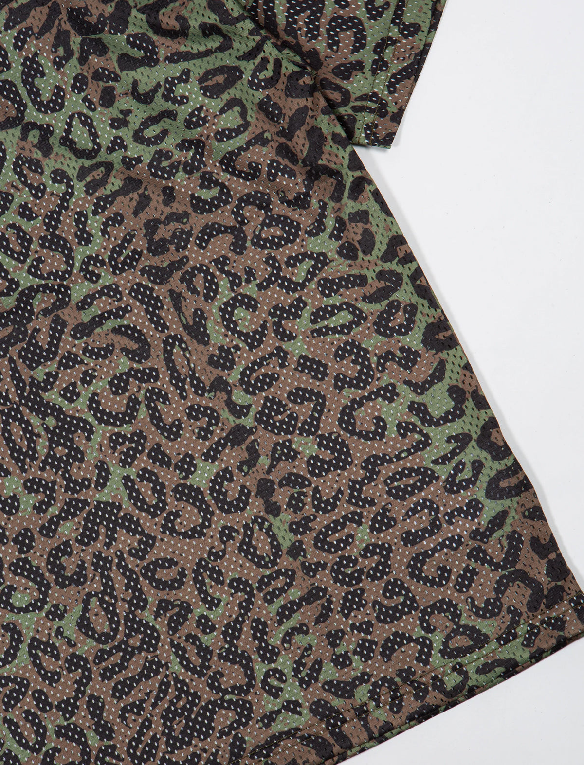 Leopard print fabric with a green and brown color scheme on a white background