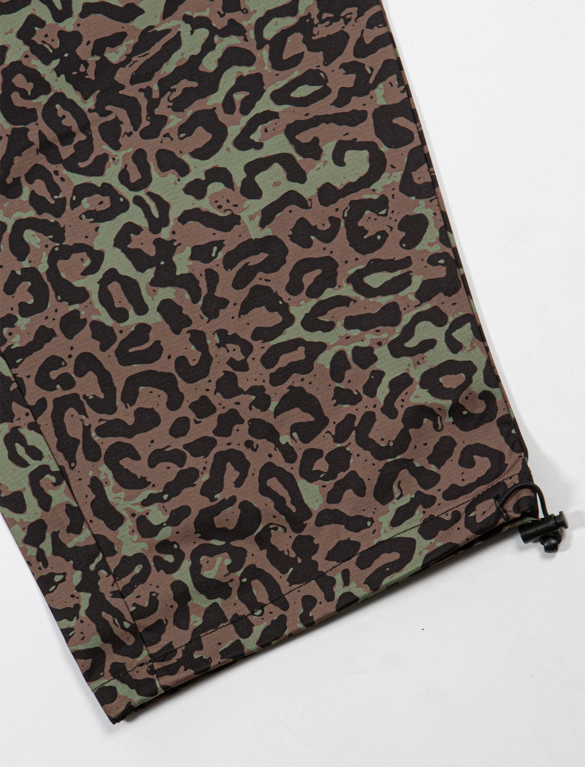 Camouflage-patterned bag on a white background