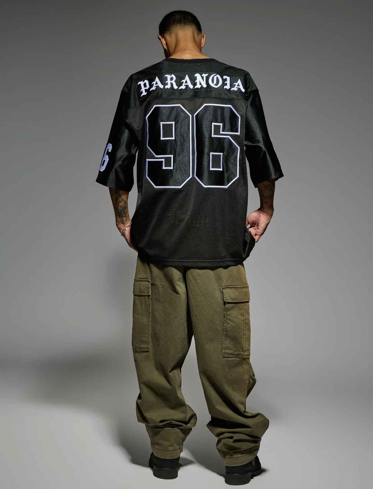 Born X Raised Paranoia Football Jersey in Black – back, worn
