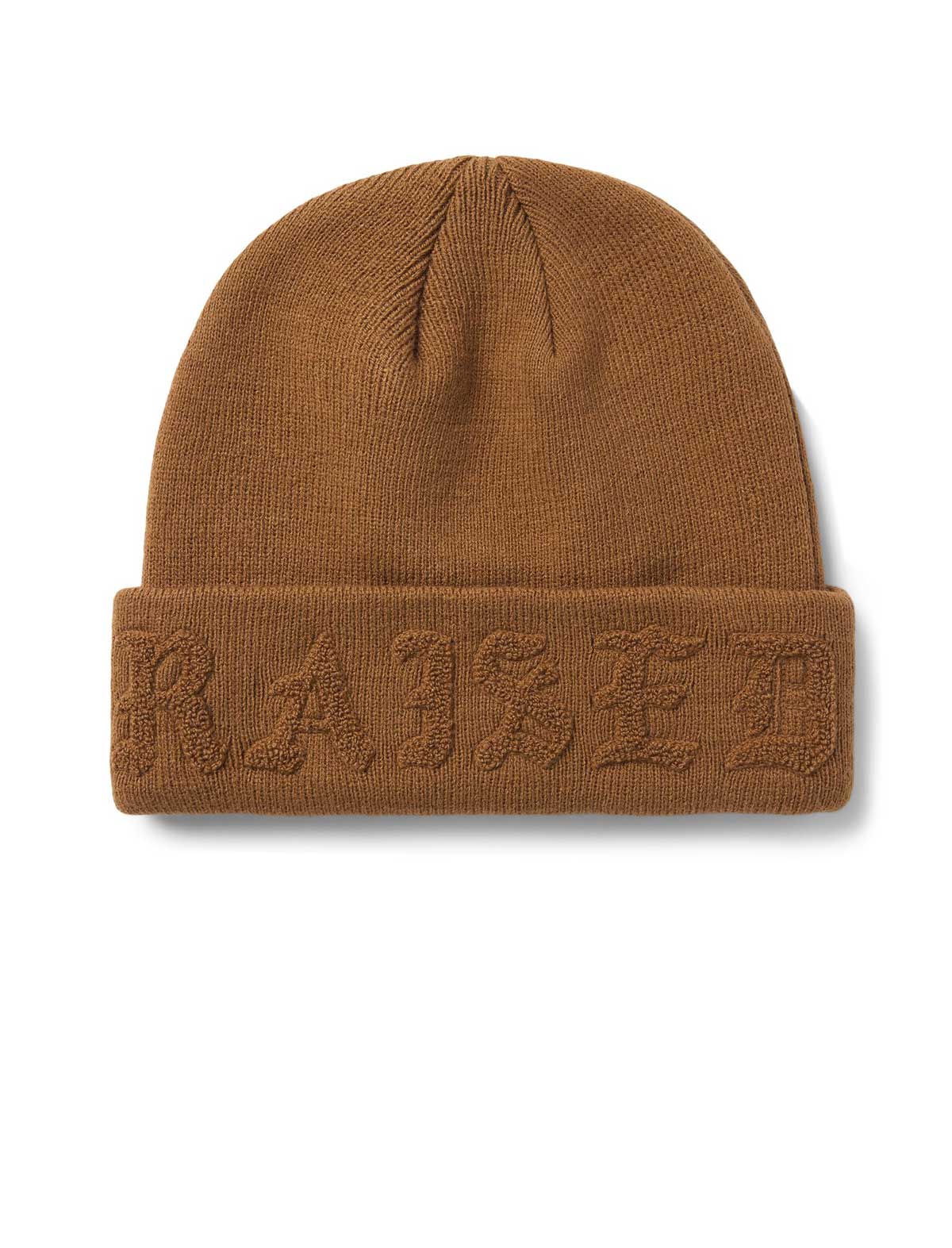 Brown beanie with embossed text 'BORN-X-RAISED' on a white background