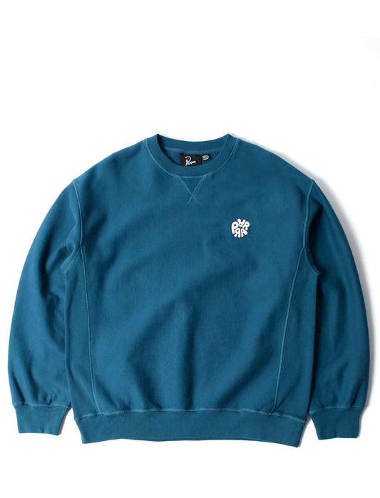 A teal blue crewneck sweatshirt with a small white embroidered Parra graphic on the left chest, displayed flat against a white background.