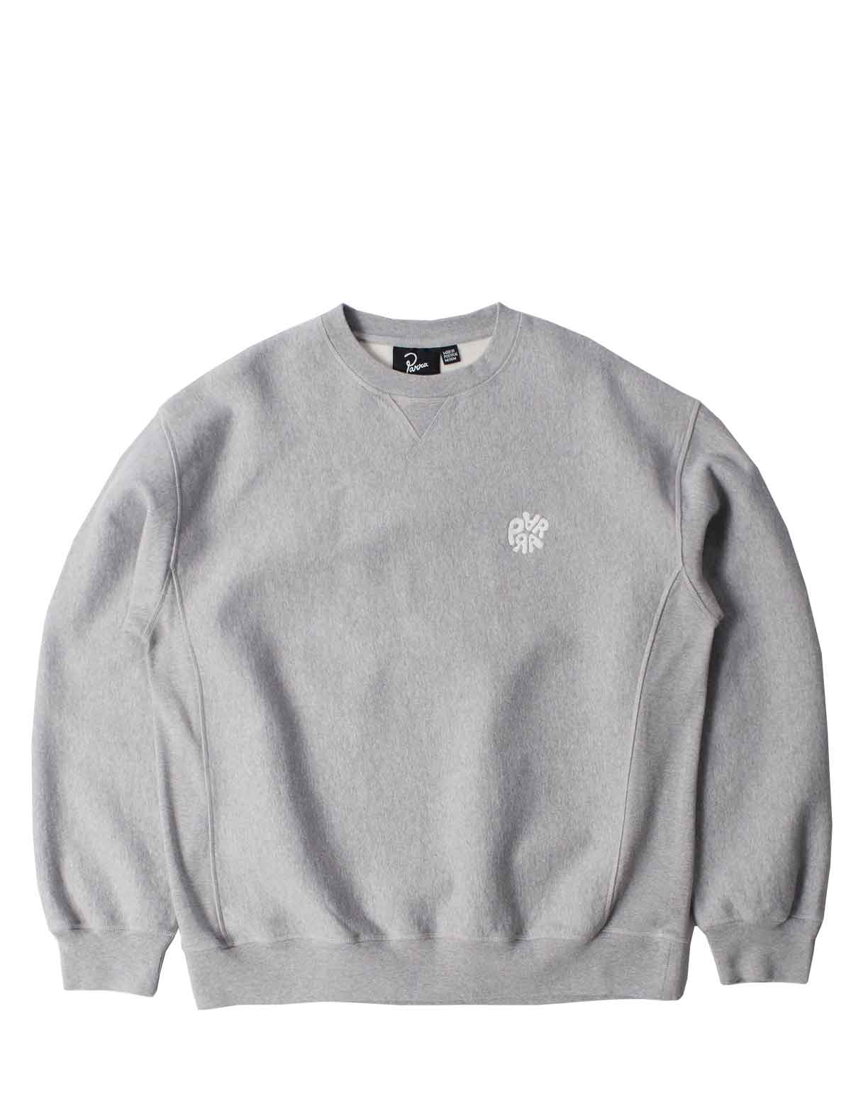 A light gray crewneck sweatshirt with a small white embroidered logo on the left chest, displayed flat against a solid white background.